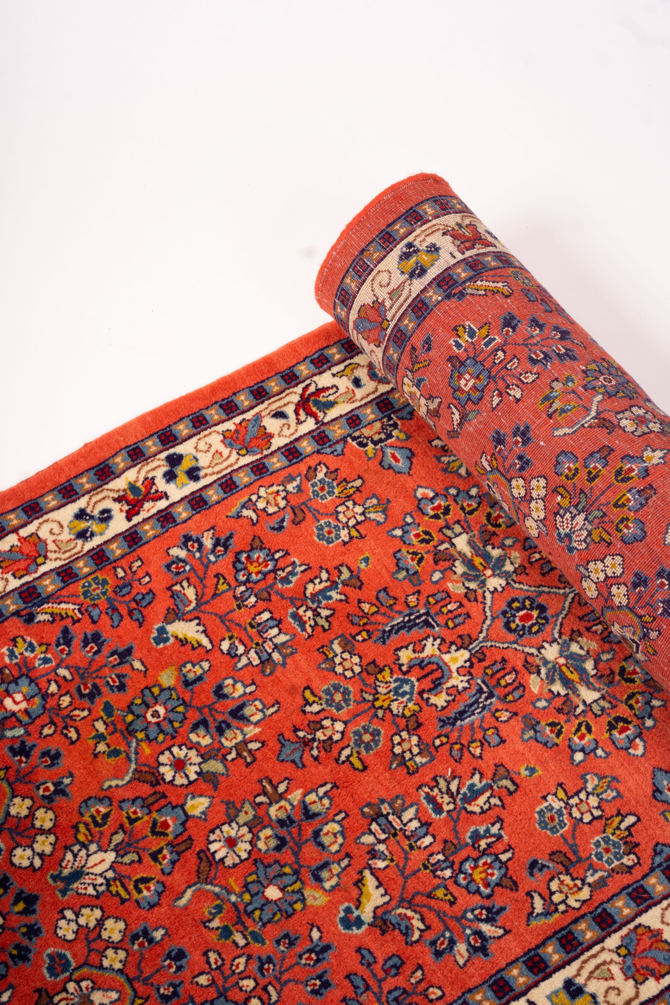 A Persian red ground runner, 202 x 83cm